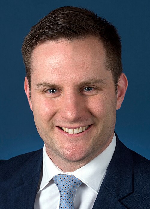Official photo of Alex Hawke